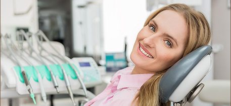 Smiling woman in dental crown