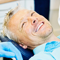 Smiling man in dental chair