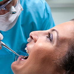 Woman receiving dental checkup