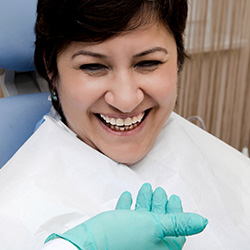 Smiling woman in dental chair