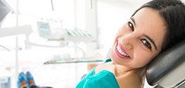 Smiling woman in dental chair